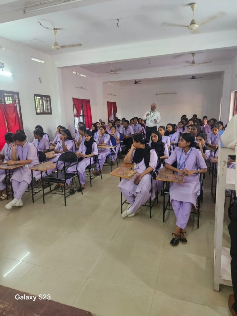 VInu Das taking a seminar at a college