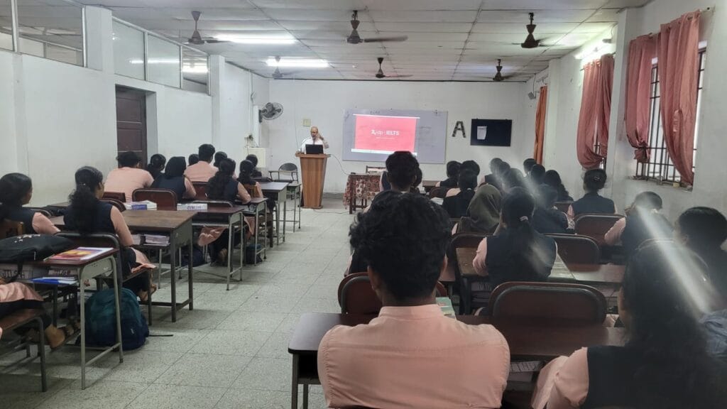 VInu Das taking a seminar at a college